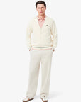 Polo manches courtes Lacoste rose chiné pour homme | Georgespaul