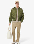 Polo manches courtes Paris Lacoste beige chiné pour homme | Georgespaul