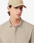 Polo manches courtes Paris Lacoste beige chiné pour homme | Georgespaul