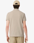 Polo manches courtes Paris Lacoste beige chiné pour homme | Georgespaul