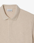 Polo manches courtes Paris Lacoste beige chiné pour homme | Georgespaul