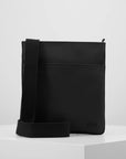 Sacoche plate unisexe Lacoste noire | Georgespaul