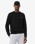 Sweat Lacoste noir pour homme | Georgespaul
