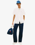 chemise-tommy-jeans-blanche-homme-DM0DM22786YBH-porte