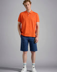 polo-paul_shark-homme-orange-porte