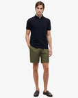 polo-tommy-hilfiger-marine-homme-MW0MW17770DW5-porte