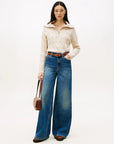 pull-femme-torsade-tommy-hilfiger-femme-beige-porte