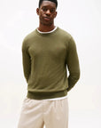 pull-tommy-hilfiger-kaki-homme-face