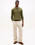 pull-tommy-hilfiger-kaki-homme-porte