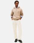 sweat-tommy-hilfiger-beige-homme-porte