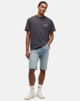 tshirt-tommy-jeans-noir-porte