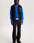 Veste sans manches Tommy Jeans noire - Georgespaul