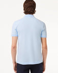 Polo Paris Lacoste bleu clair - Georgespaul