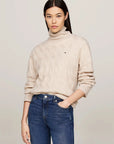 Pull col roulé Tommy Hilfiger beige en laine pour femme | Georgespaul