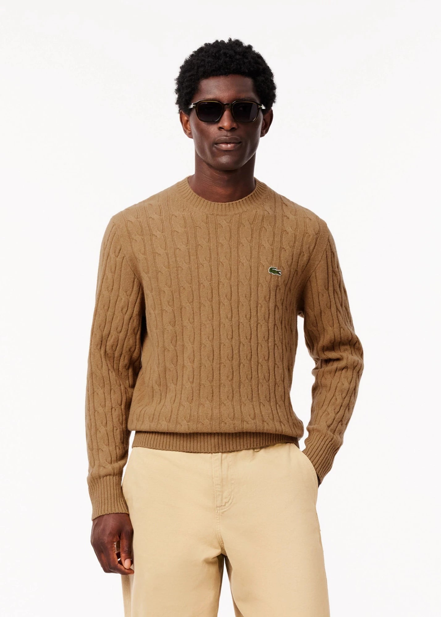 Pull torsadé Lacoste beige en laine pour homme | Georgespaul