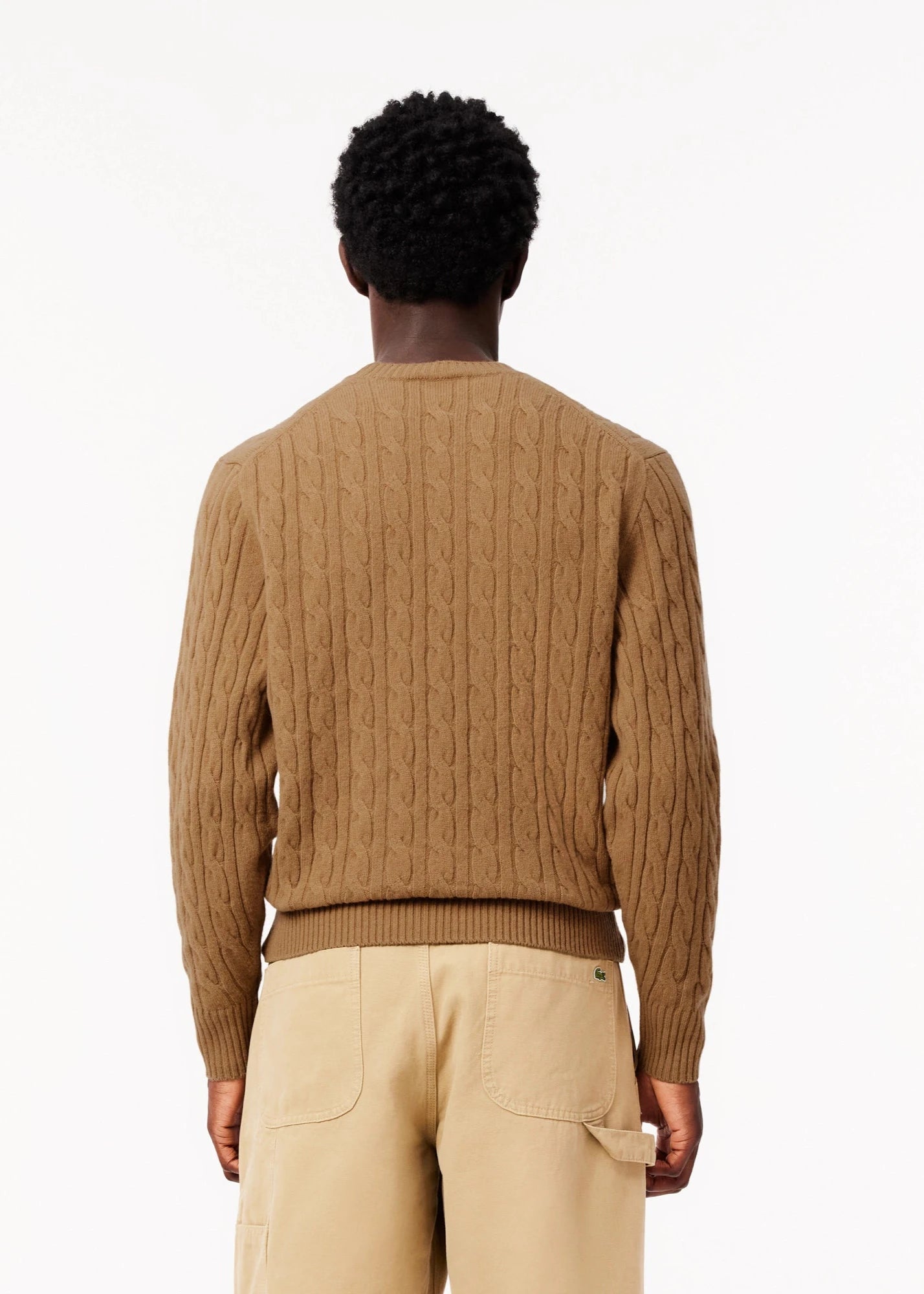 Pull torsadé Lacoste beige en laine pour homme | Georgespaul