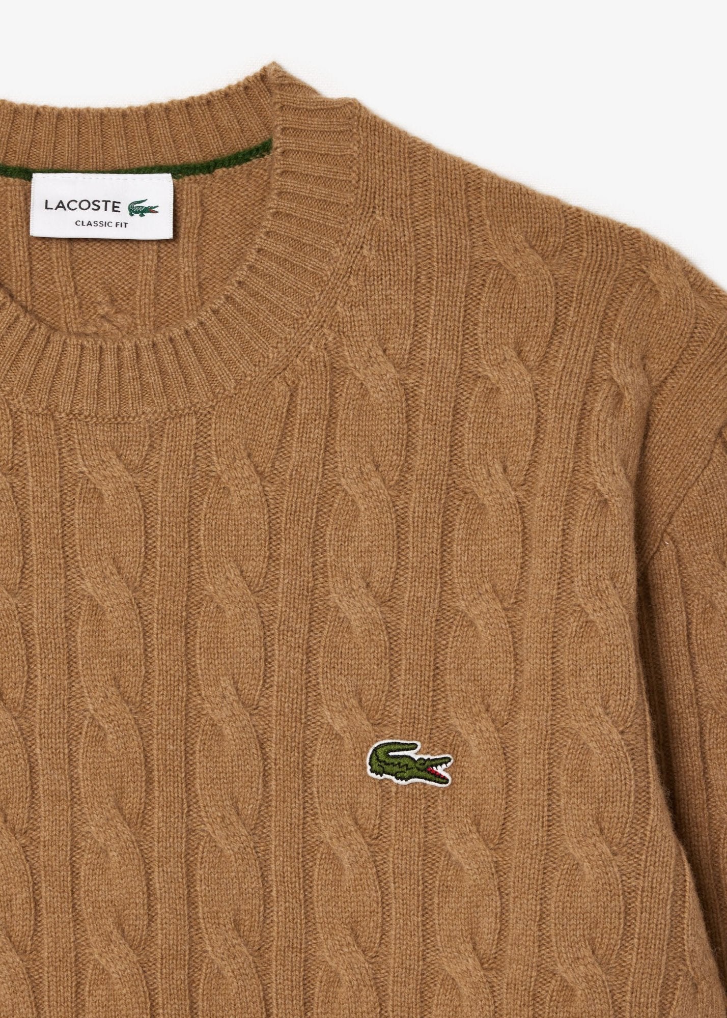 Pull torsadé Lacoste beige en laine pour homme | Georgespaul