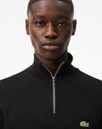 Pull Lacoste demi-zip noir pour homme | Georgespaul