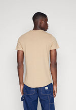 Laden Sie das Bild in den Galerie-Viewer, T-Shirt Tommy Jeans beige en coton bio | Georgespaul
