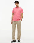 polo-tommy-hilfiger-rose-homme-MW0MW17770THH-porte