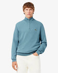 pull-camionneur-lacoste-bleu-homme-AH1980-00-57I-face-porte