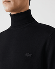 Pull à col roulé Lacoste noir en laine mérinos - Georgespaul