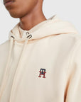 Sweat à capuche Tommy Hilfiger beige en coton bio - Georgespaul