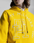 Sweat à capuche monogramme Tommy Hilfiger jaune en coton bio - Georgespaul